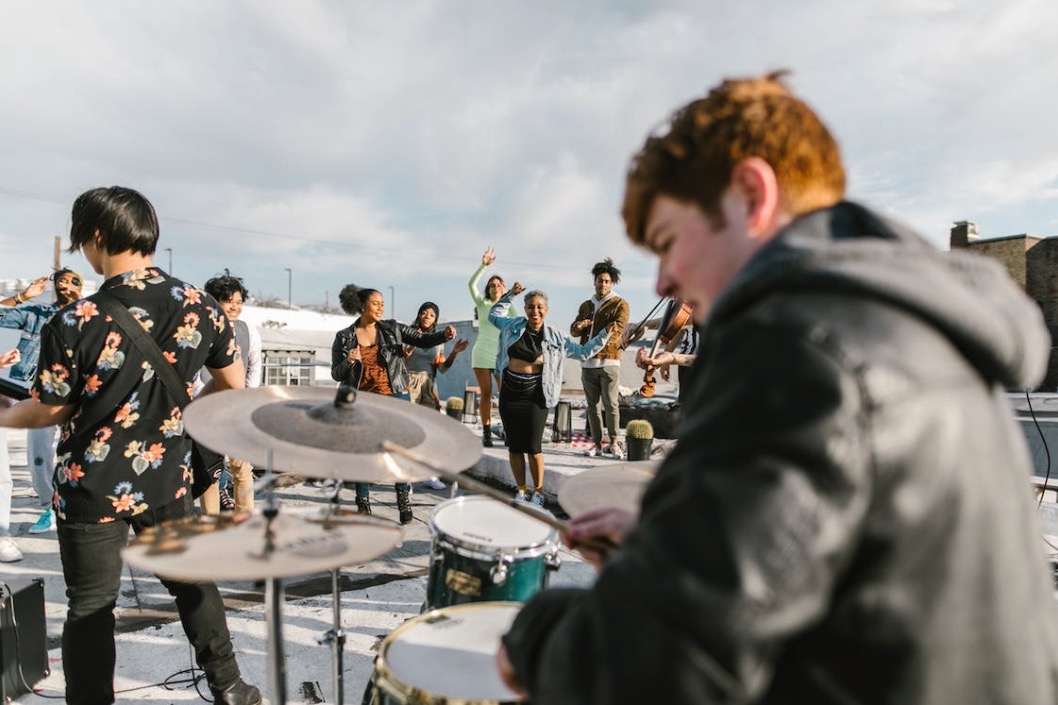 Photo of a band performing on a rooftop press release examples cover image