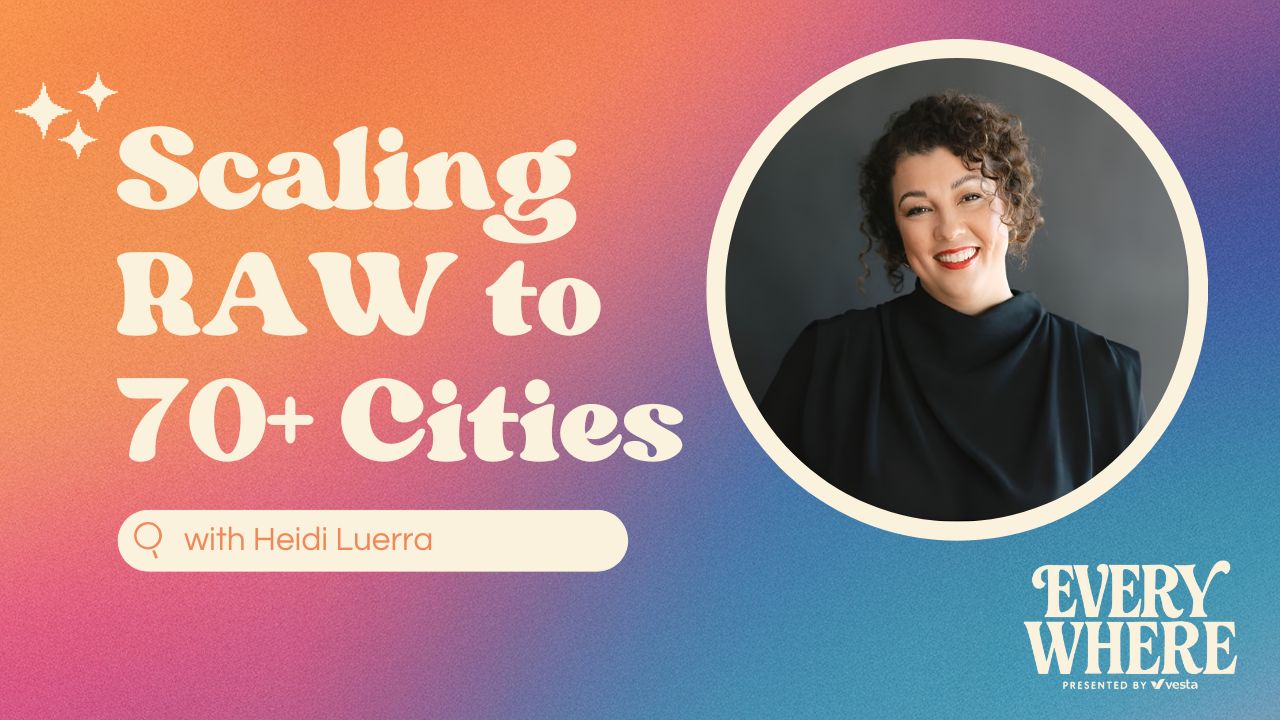 Gradient graphic with warm orange to cool purple tones featuring the text “Scaling RAW to 70+ Cities” with sparkles, and “with Heidi Luerra” inside a search bar design. On the right is a circular photo of a smiling woman with curly hair wearing a black top. Bottom right corner includes the logo “Everywhere, presented by Vesta.”